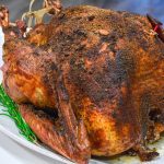 Smoked Turkey is a great alternative way to make the Thanksgiving turkey with a simple brine recipe and then 4 to 6 hours on the smoker.