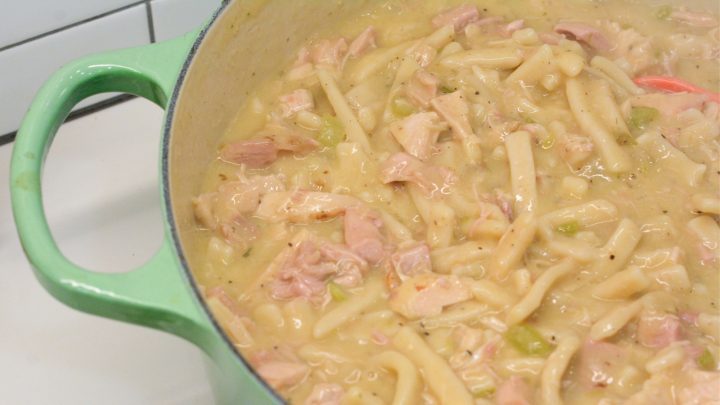 Turkey and Noodles made with leftover turkey is easily made on the stove by sauteing onoins, celery, and garlic together before adding the turkey, broth, and Reames wide noodles.