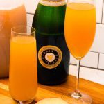 Kickoff Thanksgiving with these two-ingredient apple cider mimosas made with the combination of sweet apple cider and your favorite champagne or sparkling wine.