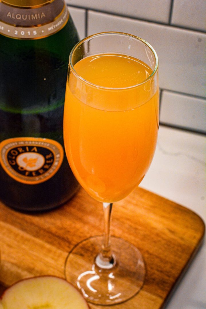 Kickoff Thanksgiving with these two-ingredient apple cider mimosas made with the combination of sweet apple cider and your favorite champagne or sparkling wine.