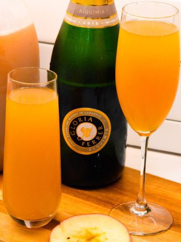 Kickoff Thanksgiving with these two-ingredient apple cider mimosas made with the combination of sweet apple cider and your favorite champagne or sparkling wine.