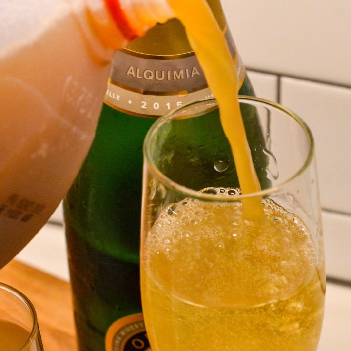 Top off the sparkling wine with apple cider.