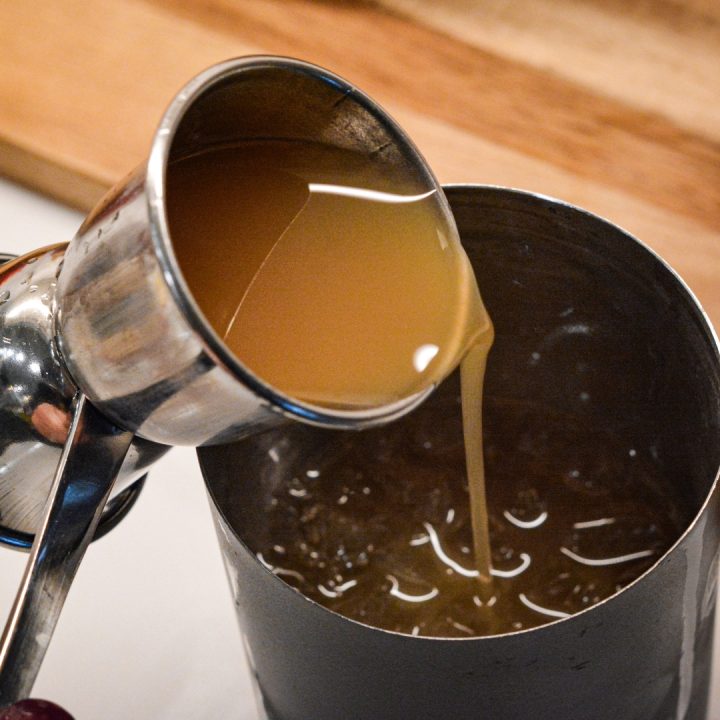 Fill a cocktail shaker with ice. Add the cider and caramel vodka. Shake vigorously for 10-15 seconds until fully combined and chilled.