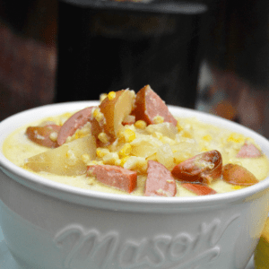 Add this simple corn chowder with smoked sausage to menu this week. This chowder is a cream based soup that slow cooks all day for an easy dinner for the family.