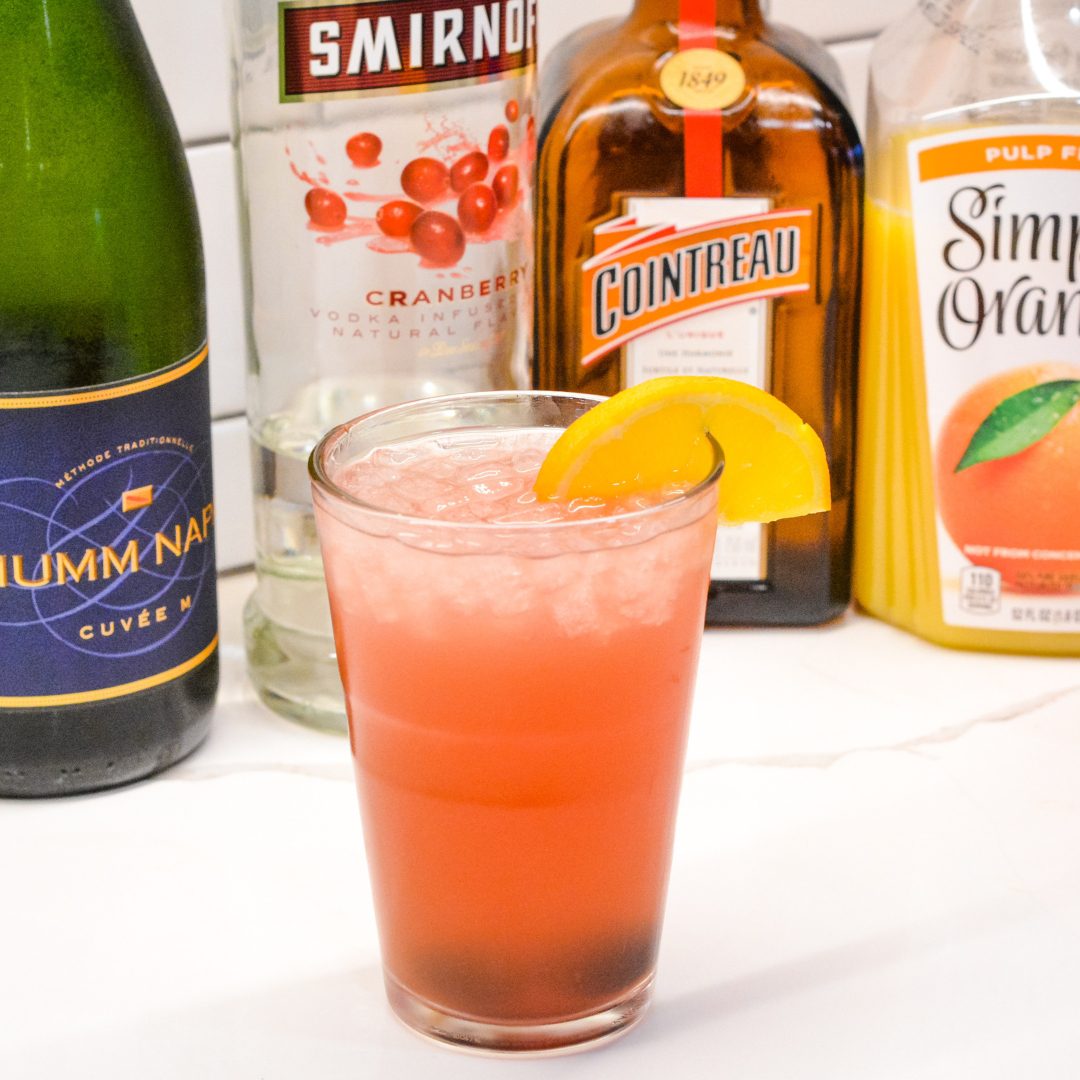 The Cranberry Orange Champagne Cocktail is a fruity cocktail that champagne with vodka, orange liqueur, cranberry juice and orange juice.