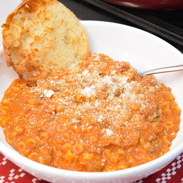 My version of homemade spaghettios uses tomato sauce, tender little pasta rings, bites of ground meat, cheese, and seasonings.