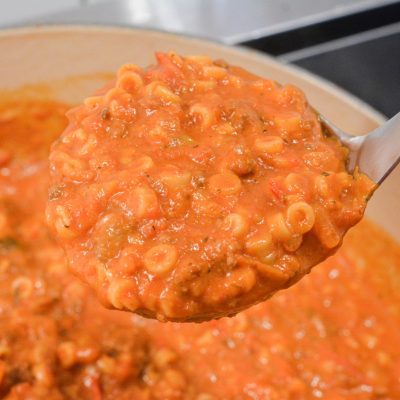 My version of homemade spaghettios uses tomato sauce, tender little pasta rings, bites of ground beef, cheese, and seasonings.