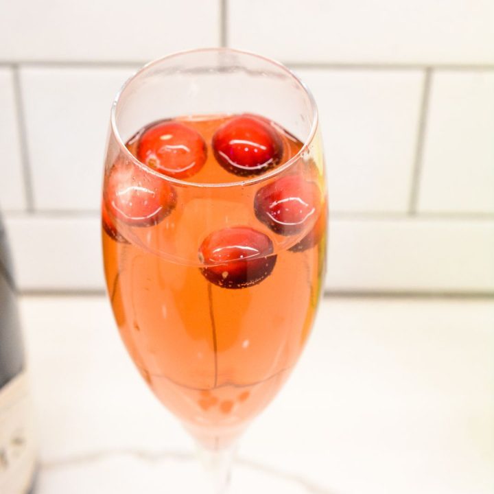 The Cranberry Limoncello Champagne Cocktail is a sparkling cocktail made with just cranberry juice, limoncello, and your favorite champagne or prosecco.