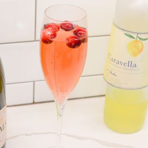 The Cranberry Limoncello Champagne Cocktail is a sparkling cocktail made with just cranberry juice, limoncello, and your favorite champagne or prosecco.