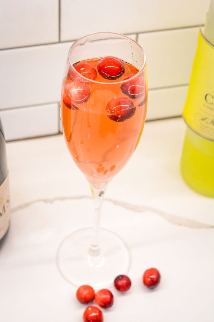 The Cranberry Limoncello Champagne Cocktail is a sparkling cocktail made with just cranberry juice, limoncello, and your favorite champagne or prosecco.