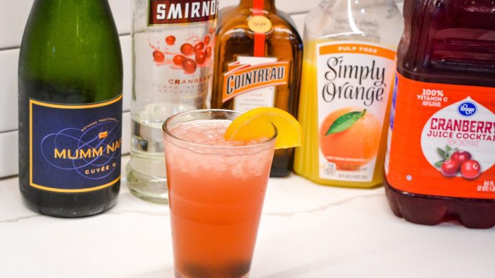 The Cranberry Orange Champagne Cocktail is a fruity cocktail that champagne with vodka, orange liqueur, cranberry juice and orange juice.