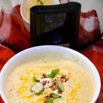 Crock pot bacon cheeseburger soup is potato soup recipe slow-cooked all day in a base of carrots, celery, onions, and garlic along with diced potato hashbrowns, ground beef, bacon, and cream cheese that just needs shredded cheddar cheese and white sauce added before serving for dinner.