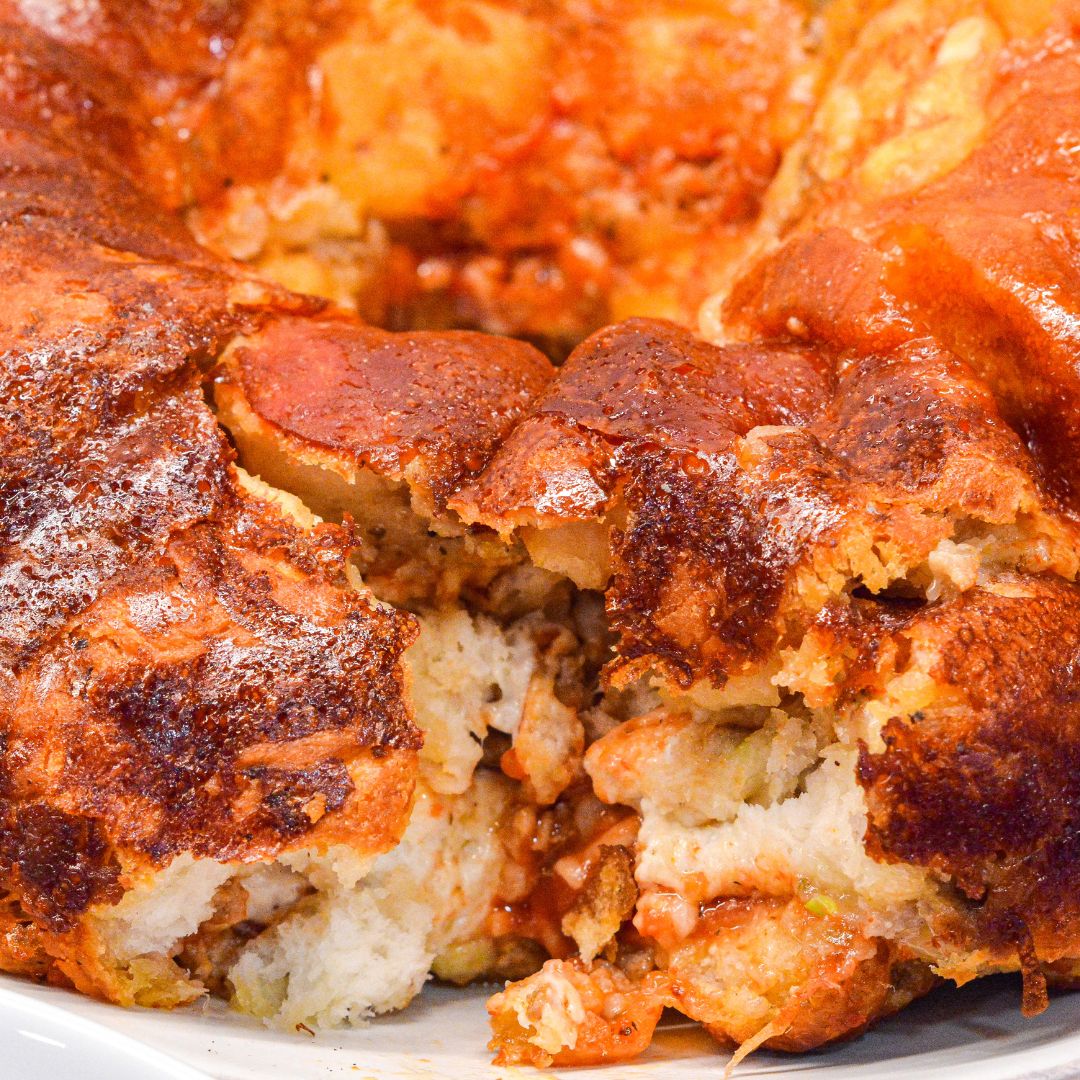 Make pizza a finger food appetizer with this sausage and pepperoni pull apart pizza bread.