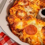 Sausage and Pepperoni Pull-Apart Pizza Bread made with refrigerator biscuits – the appetizer version of the classic sausage and pepperoni pizza that's not only delicious but also incredibly easy to make.