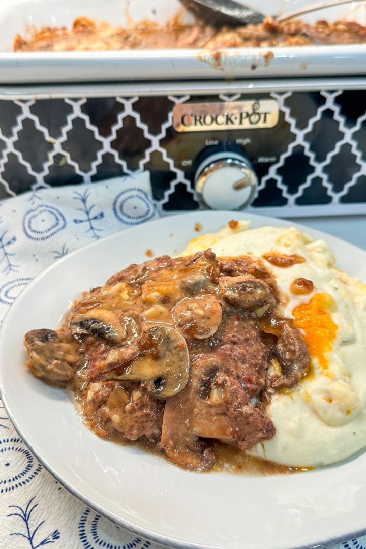 Crock Pot Salisbury Steaks made with frozen hamburger patties and French onion soup are the perfect solution for an effortless meal.