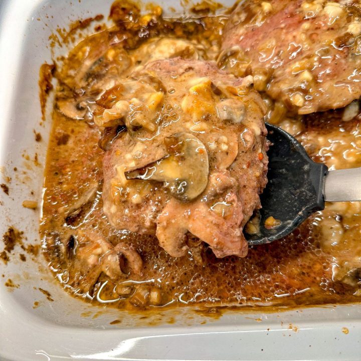 Crock Pot Salisbury Steaks made with frozen hamburger patties and French onion soup are the perfect solution for an effortless meal.