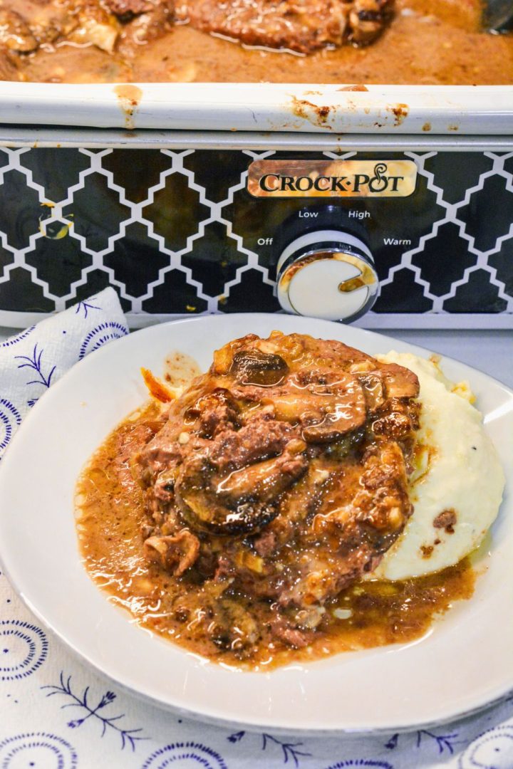 Crock Pot Salisbury Steaks made with frozen hamburger patties and French onion soup are the perfect solution for an effortless meal.