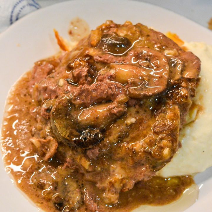 Crock Pot Salisbury Steaks made with frozen hamburger patties and French onion soup are the perfect solution for an effortless meal.