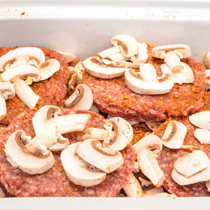 Season the remaining patties and lay over the top of the first layer of patties and mushrooms. 