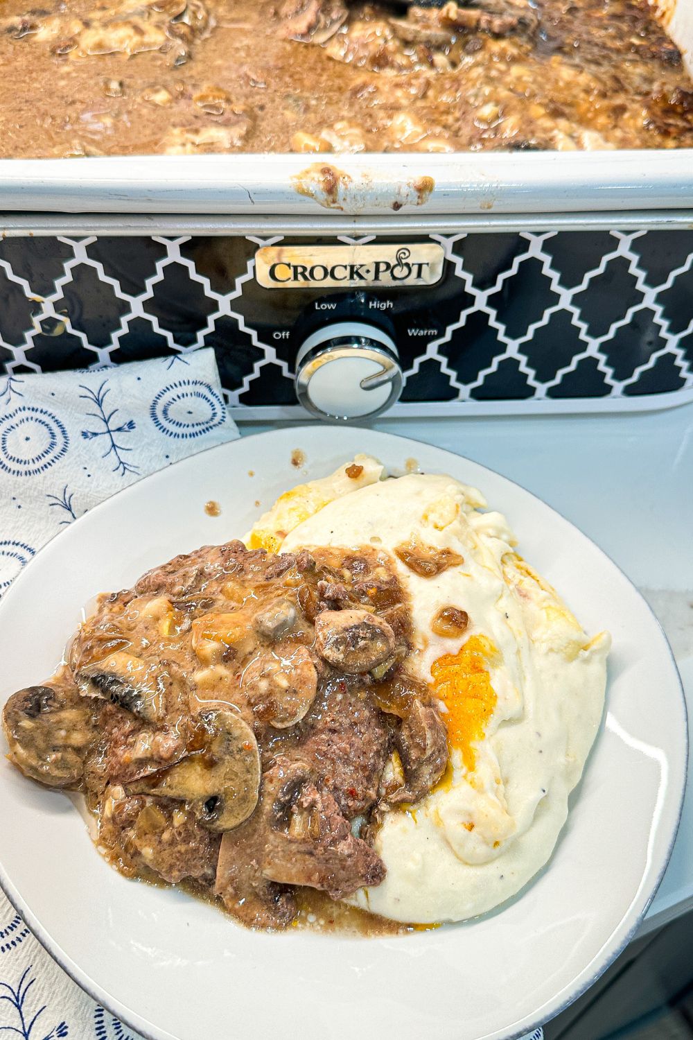 Crock Pot Salisbury Steaks made with frozen hamburger patties and French onion soup are the perfect solution for an effortless meal.