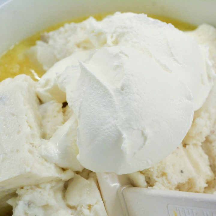 Mix the mashed potatoes, melted butter, cream cheese, sour cream, and French fry seasoning in a large bowl. Stir to combine into the base of the mashed potato casserole.