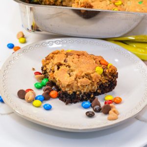 These fudgy brownie monster cookie bars will be a major hit and one off your favorite brookie bar recipes.