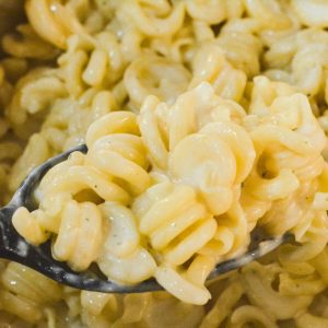 This white macaroni and cheese is a stovetop mac and cheese recipe made all in one pot with milk, cream, butter, cream cheese, and Italian cheeses.
