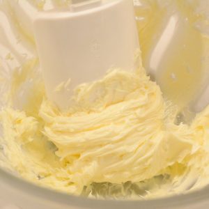 Begin by creaming the softened butter in a large bowl for 2-3 minutes. You want the butter to be really fluffy.