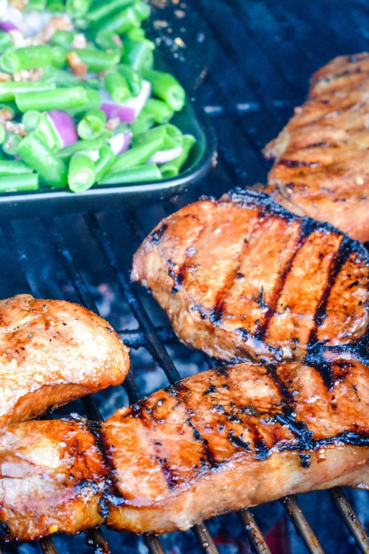 Easy Grilled Pork Chops in a soy sauce and honey pork chop marinade is so full of flavor from soy sauce, honey, red pepper flakes, and garlic.