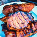 Easy Grilled Pork Chops in a soy sauce and honey pork chop marinade is so full of flavor from soy sauce, honey, red pepper flakes, and garlic.