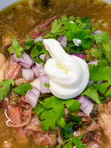 If you're a fan of bold, smoky flavors and fall-off-the-bone tender pork, then this crock pot smoked pork chile verde will be your new favorite dish.