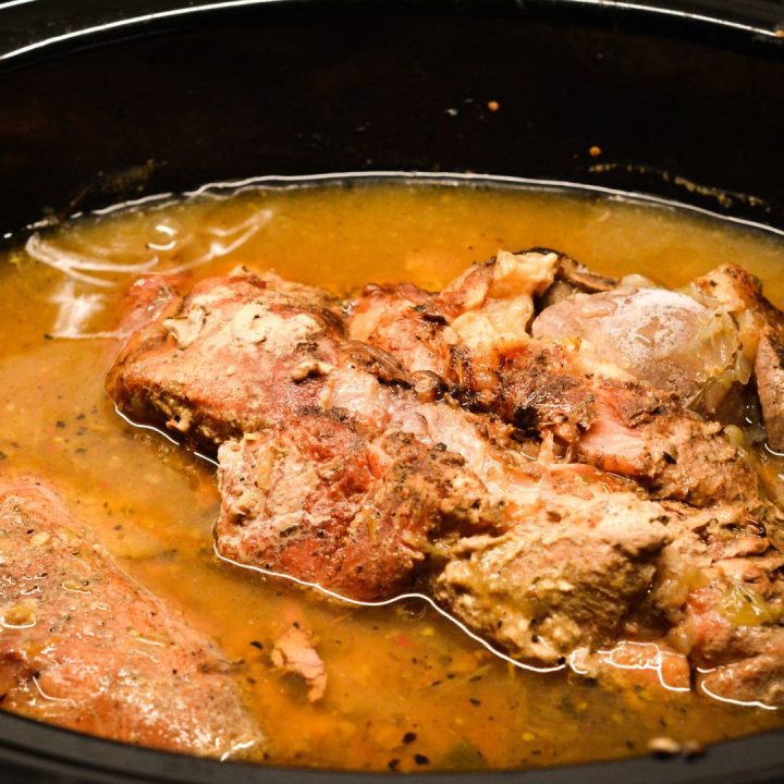When the pork is fork tender, shred the pork with large forks or remove it from the crock pot and cut it into chunks. Then stir the broth and salsa into the pork.