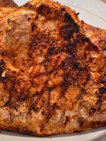 The secret to grilling pork chops? A perfectly balanced homemade dry rub that brings out the best in your meat.