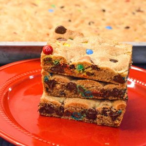 These M&M and Chocolate Chip Cookie Bars with Vanilla Pudding are soft, chewy, and loaded with chocolatey goodness! The secret? Melted butter + Crisco and a box of vanilla pudding mix for that perfect gooey texture.