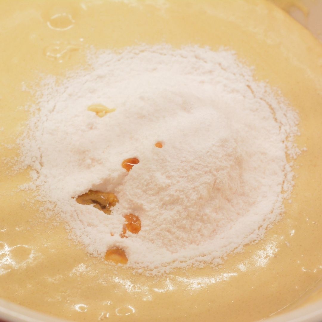 Pour the pudding and vanilla into the wet ingredients. Mix until thoroughly mixed and no longer gritty looking.