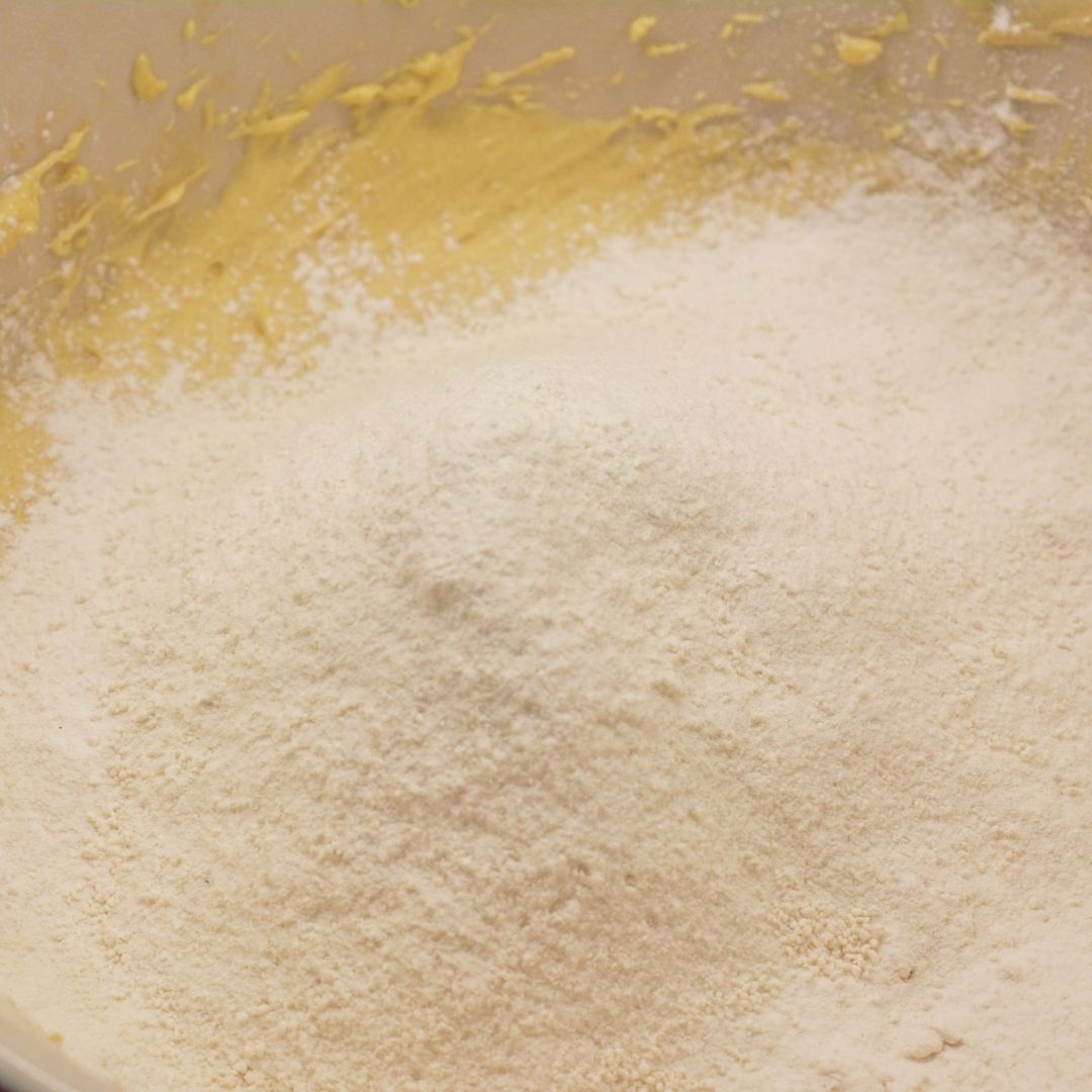 In a separate bowl, whisk together the flour, vanilla pudding mix, baking soda, and salt. Gradually add the dry ingredients to the wet mixture, stirring just until everything is combined.