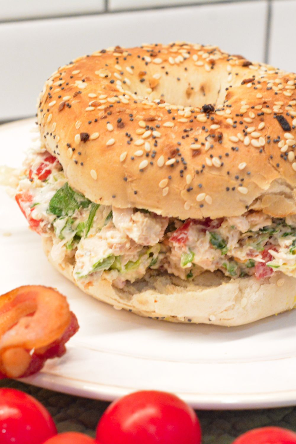 These chopped chicken bacon ranch salad bagels are the ultimate 15-minute lunch! Made with rotisserie chicken, crispy bacon, fresh tomatoes, lettuce, and ranch-seasoned cream cheese—every bite is packed with bold flavor and satisfying crunch.