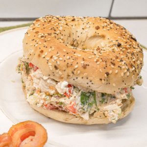 These chopped chicken bacon ranch salad bagels are the ultimate 15-minute lunch! Made with rotisserie chicken, crispy bacon, fresh tomatoes, lettuce, and ranch-seasoned cream cheese—every bite is packed with bold flavor and satisfying crunch.