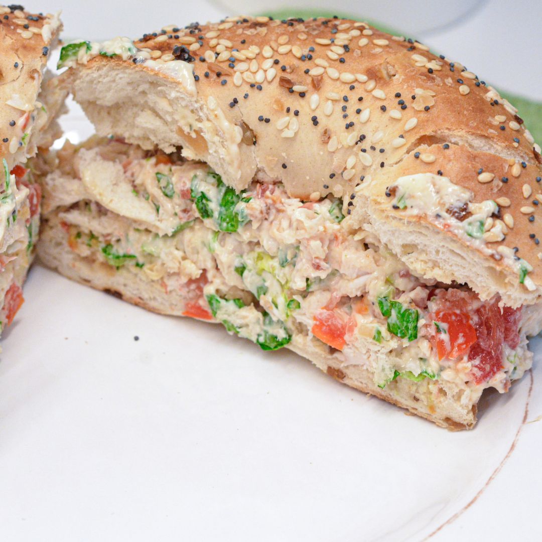 These chopped chicken bacon ranch salad bagels are the ultimate 15-minute lunch! Made with rotisserie chicken, crispy bacon, fresh tomatoes, lettuce, and ranch-seasoned cream cheese—every bite is packed with bold flavor and satisfying crunch.