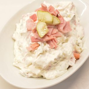 This creamy pickle wrap dip made with deli ham, cream cheese, and dill pickles is the ultimate party appetizer. All the flavor of classic pickle wraps without the work!