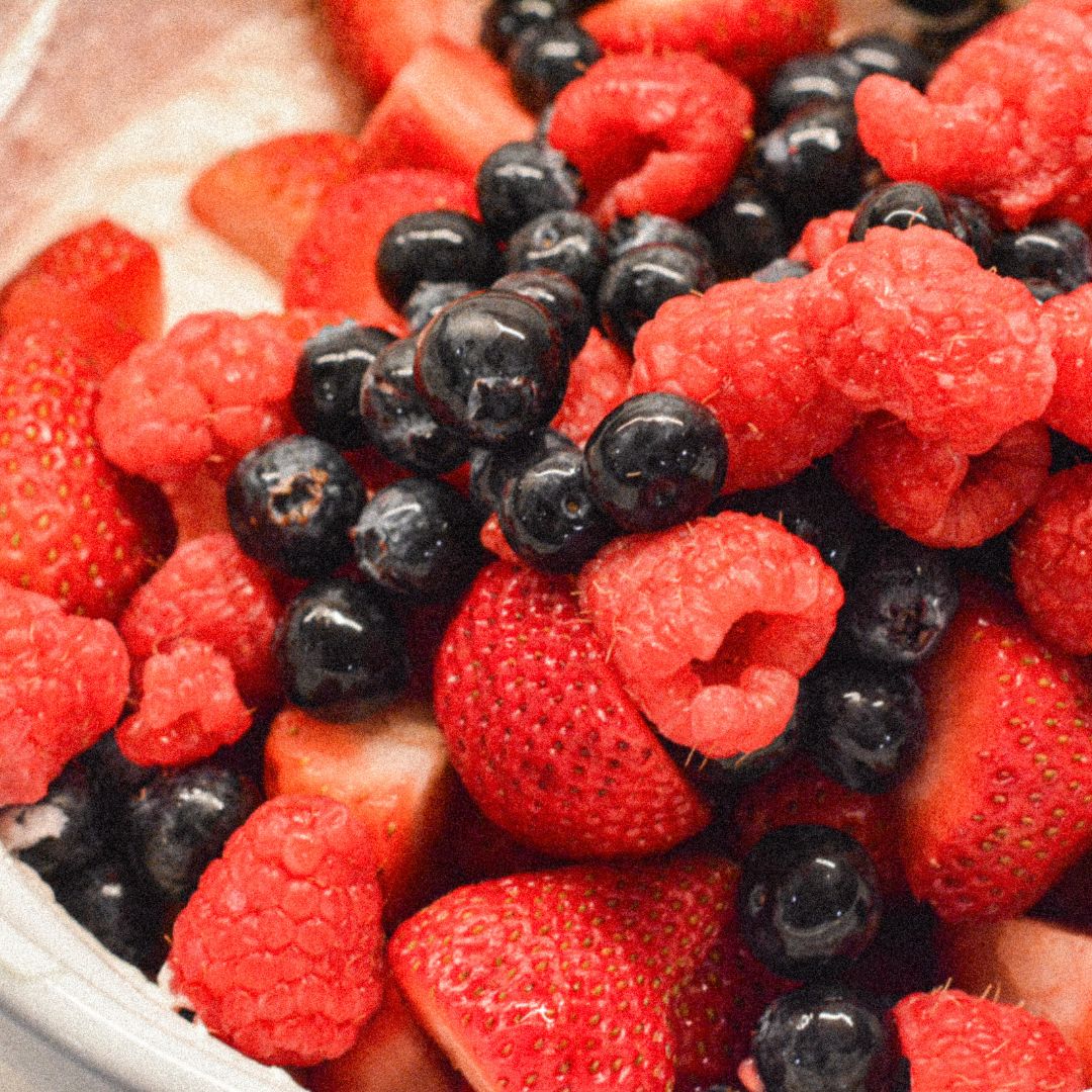 Carefully fold in the strawberries, blueberries, and raspberries. If you’re using banana slices, wait to add them just before serving.