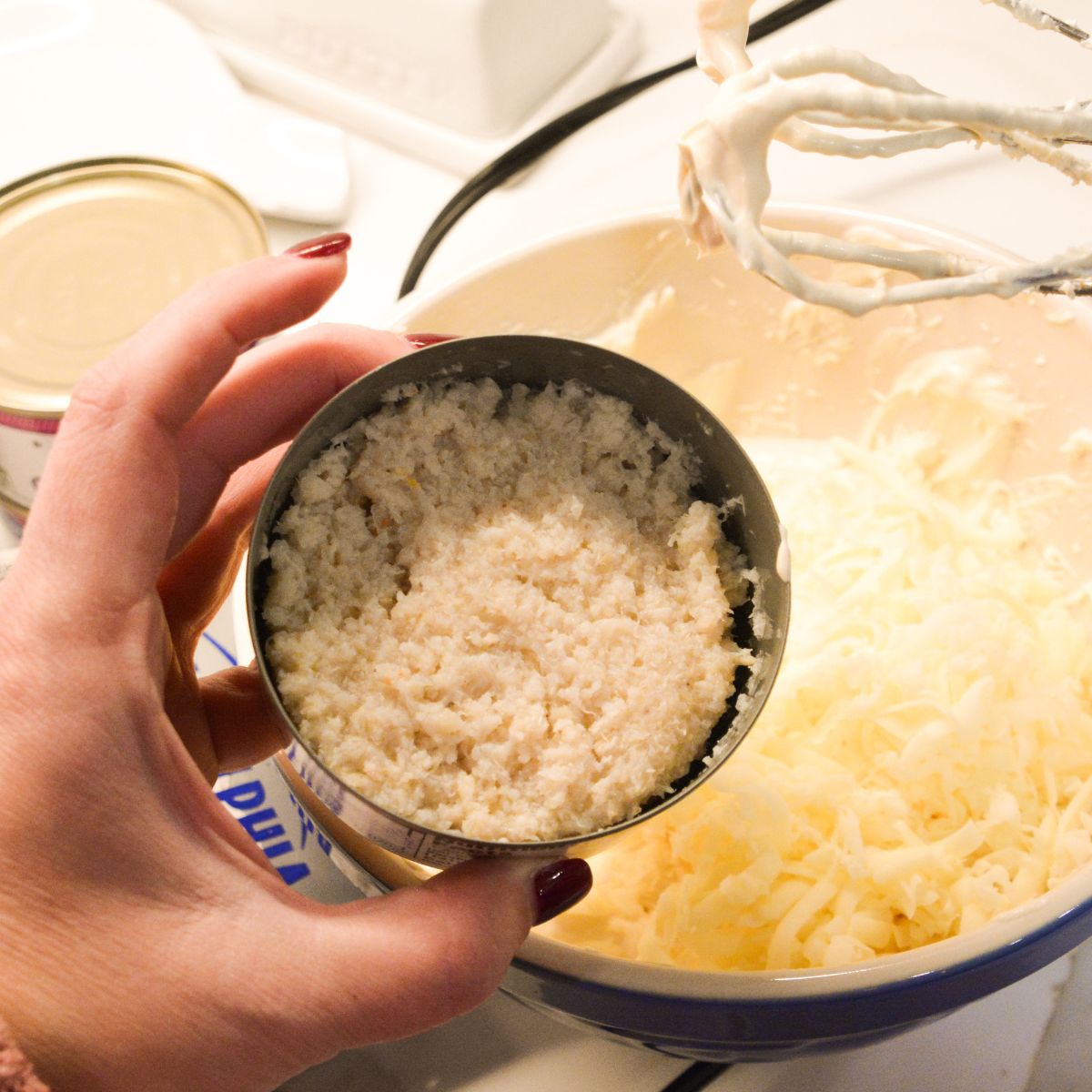 Fold in the crab meat, green onions, and cheeses. Add sriracha if you want a spicy twist.