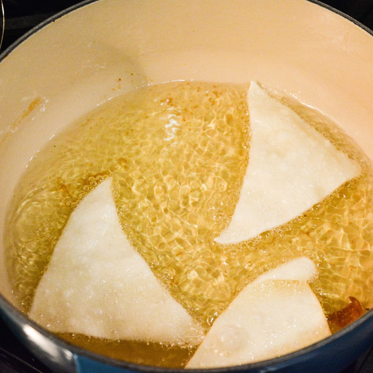 Add a few wonton pieces at a time — don’t overcrowd! Fry for 30–45 seconds per side, or until golden brown.