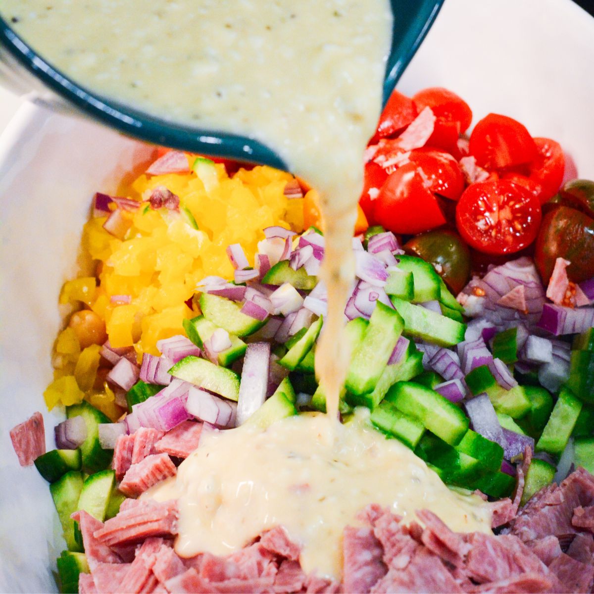 Pour the dressing over the bean mixture. Stir until everything is evenly coated.