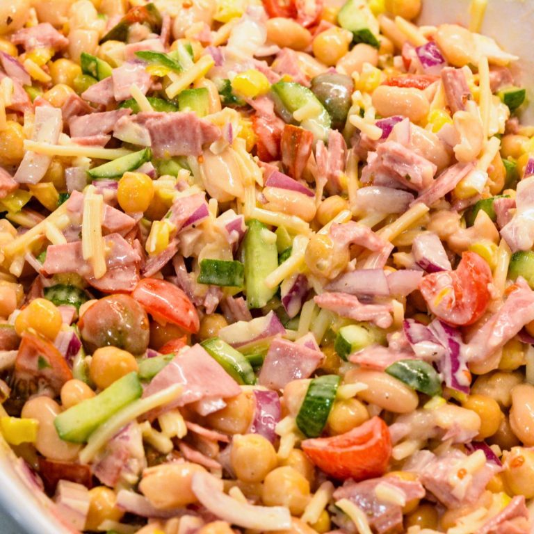This Italian Grinder Bean Salad is a creamy, no-cook bean salad inspired by BeanTok and classic Italian grinder flavors. Made with chickpeas, cannellini beans, shredded Italian cheese, and a creamy Italian dressing, it’s an easy high-protein lunch or side dish that gets even better as it chills.